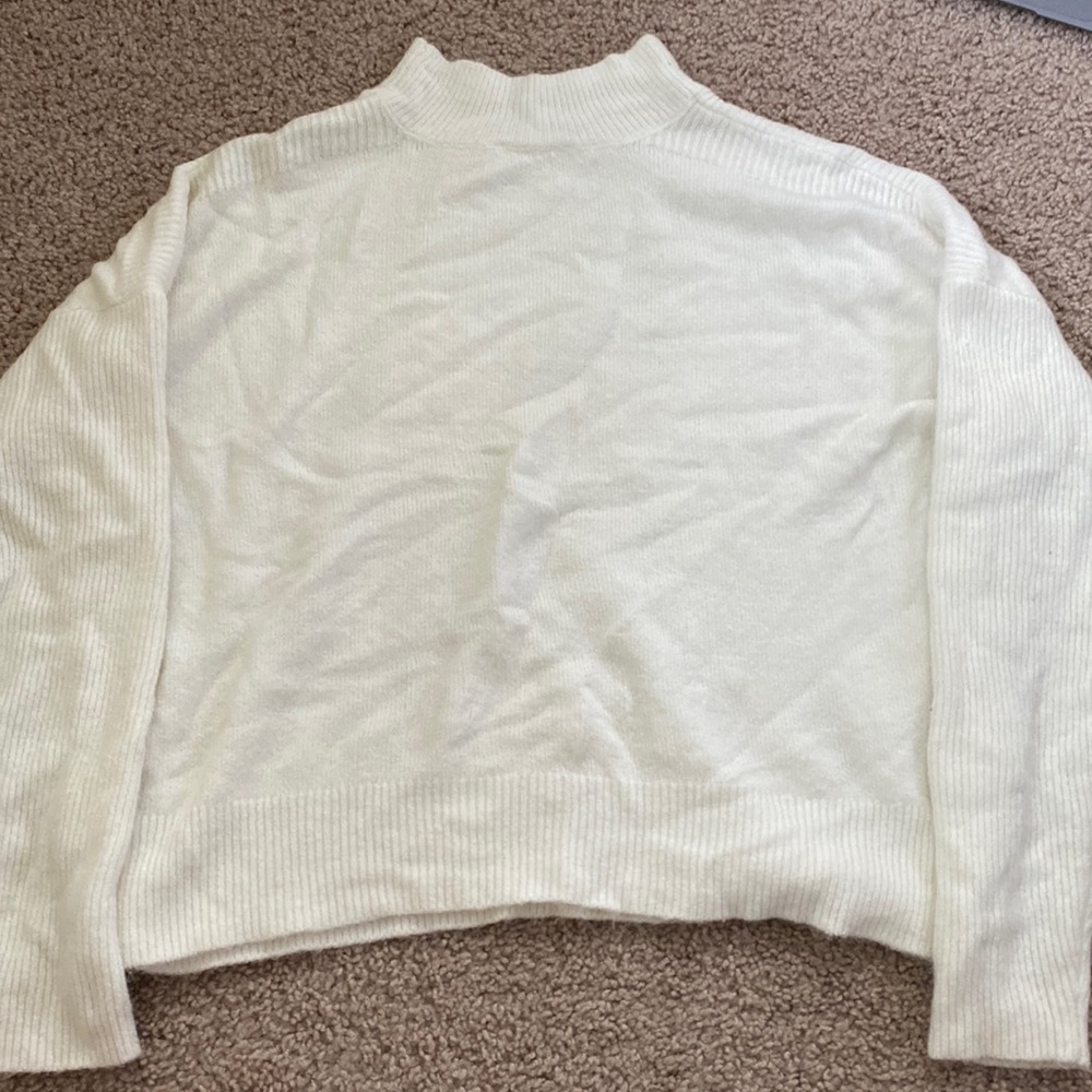 White mock neck sweater